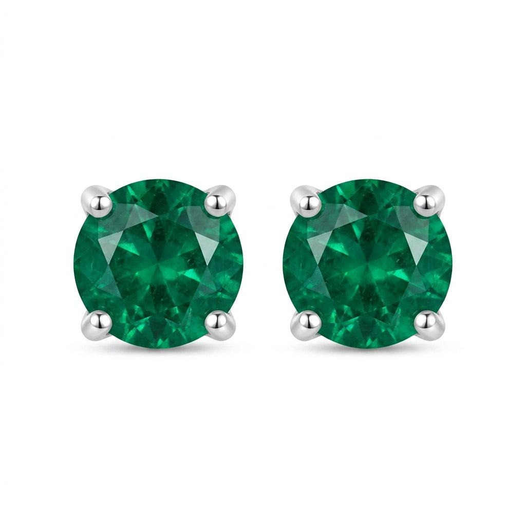 Puces d'oreilles émeraude taille ronde en or blanc