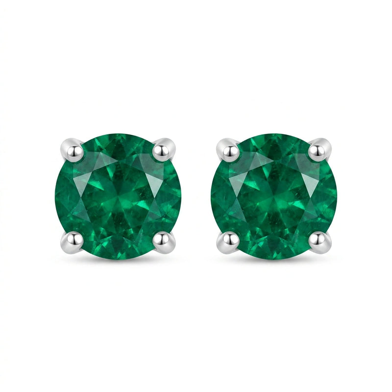 Puces d'oreilles émeraude taille ronde en or blanc