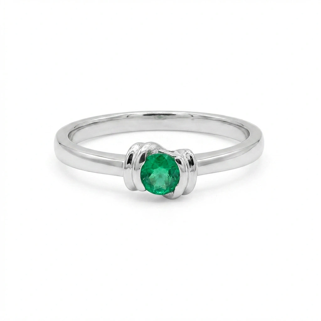 18k White Gold Ring with a Muzo Colombian Emerald on a white background.